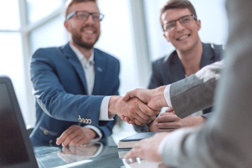 Shaking hands with an EXP international advisor